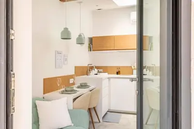 Cuisine ou kitchenette dans l'établissement Aux Voûtes de Granit - 10 mn Lyon