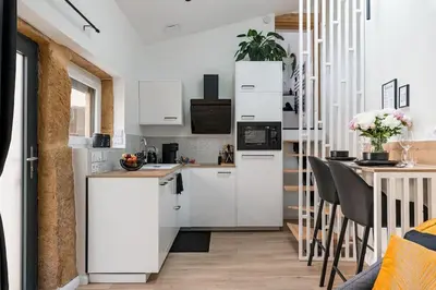 Cuisine ou kitchenette dans l'établissement Aux Pierres Dorées 10 min centre de Lyon
