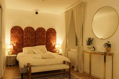 Un ou plusieurs lits dans un hébergement de l'établissement Suite Meraki - Luxe & Voyage - Jacuzzi & Cinéma