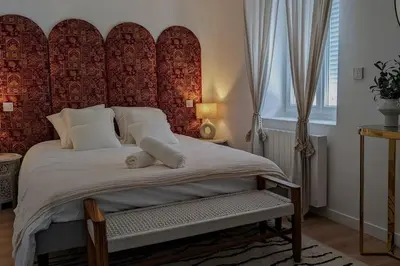 Un ou plusieurs lits dans un hébergement de l'établissement Suite Meraki - Luxe & Voyage - Jacuzzi & Cinéma