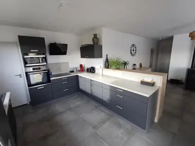 Cuisine ou kitchenette dans l'établissement Au cœur des pierres dorées