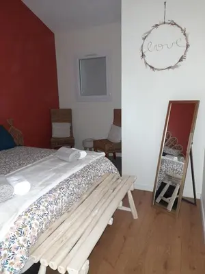 Un ou plusieurs lits dans un hébergement de l'établissement Petit coin de paradis