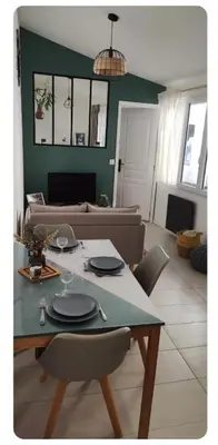 Coin salon dans l'établissement Maisonnette cosy et calme