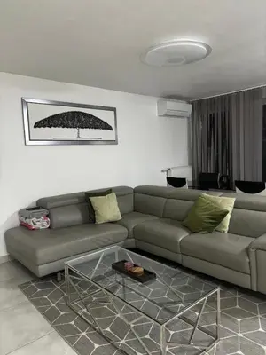 Coin salon dans l'établissement Appartement t3 70 m2
