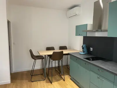 Cuisine ou kitchenette dans l'établissement Le perroquet