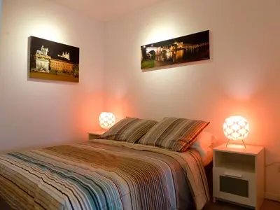 Un ou plusieurs lits dans un hébergement de l'établissement B&B 