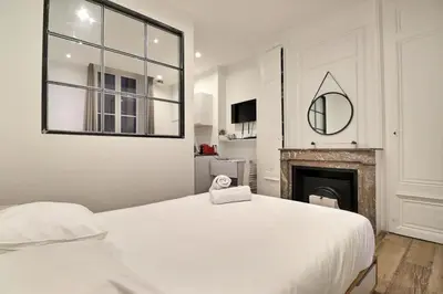 Un ou plusieurs lits dans un hébergement de l'établissement Le Petit Condé - Fully equipped studio - Lyon 2nd