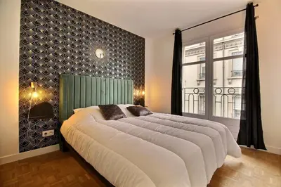 Un ou plusieurs lits dans un hébergement de l'établissement Le Tropical - Beautiful apartment - Lyon 7th