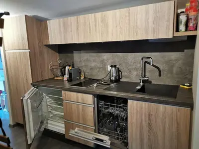 Cuisine ou kitchenette dans l'établissement Appart climatisé Terrasse Vue sur Lyon et les quais de Saône