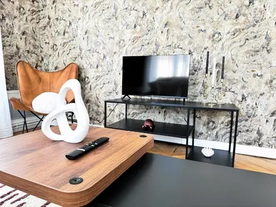 Télévision ou salle de divertissement dans l'établissement Merengue - Appartement 10 personnes - Check in h24 & Wifi