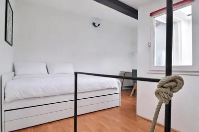 Un ou plusieurs lits dans un hébergement de l'établissement Le St Georges - Charming & Spacious flat - Lyon 5th