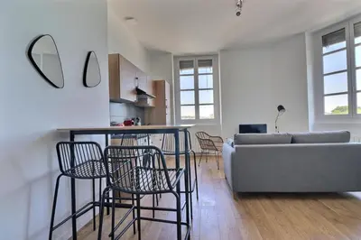 Coin salon dans l'établissement Le Quai d'Or - Apartment for monthly rental - Lyon 4th