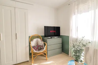 Télévision ou salle de divertissement dans l'établissement Le Florence - Studio Grange Blanche