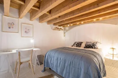 Un ou plusieurs lits dans un hébergement de l'établissement Studio bohème-chic, coeur de Presqu'île, Perrache