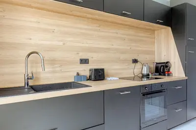 Cuisine ou kitchenette dans l'établissement Chaleureux et Cosy avec parking privé