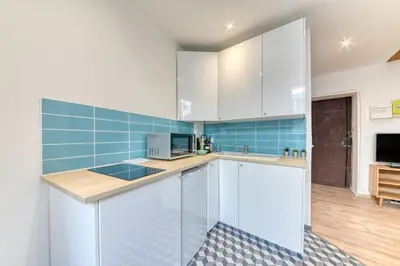 Cuisine ou kitchenette dans l'établissement Le Saint-Georges, BNBConciergerie