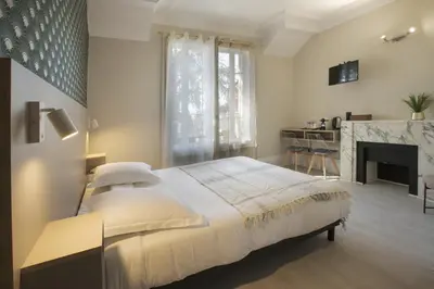 Un ou plusieurs lits dans un hébergement de l'établissement GAB HOUSE - Lyon Bron - Eurexpo City Living Stay