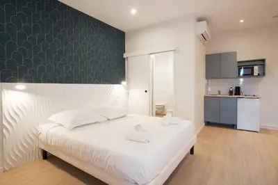 Un ou plusieurs lits dans un hébergement de l'établissement GAB HOUSE - Lyon Bron - Eurexpo City Living Stay