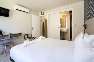 Un ou plusieurs lits dans un hébergement de l'établissement GAB HOUSE - Lyon Bron - Eurexpo City Living Stay