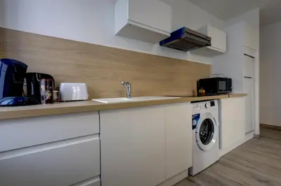 Cuisine ou kitchenette dans l'établissement Le Westy 1