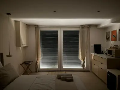 Un ou plusieurs lits dans un hébergement de l'établissement Suite l'Aparté
