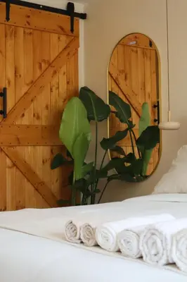Un ou plusieurs lits dans un hébergement de l'établissement Suite l'Aparté