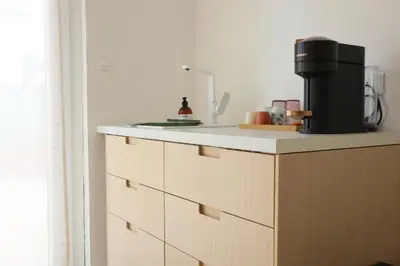 Cuisine ou kitchenette dans l'établissement Suite l'Aparté