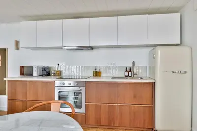 Cuisine ou kitchenette dans l'établissement NOCNOC Le Trianon