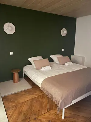 Un ou plusieurs lits dans un hébergement de l'établissement NOCNOC Le Trianon
