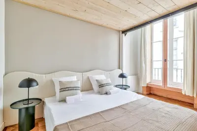 Un ou plusieurs lits dans un hébergement de l'établissement NOCNOC Le Trianon