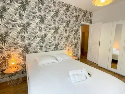 Un ou plusieurs lits dans un hébergement de l'établissement Le Cour Vitton - Lyon 6ème - Proche Parc Tête d'Or