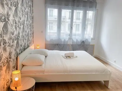 Un ou plusieurs lits dans un hébergement de l'établissement Le Masséna - Lyon 6ème - Proche Parc Tête d'Or