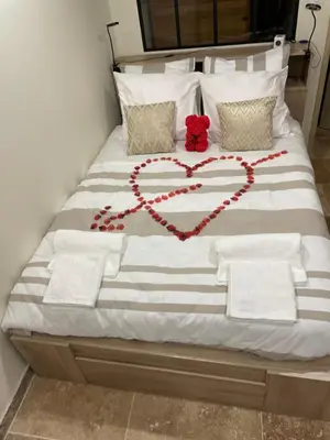 Un ou plusieurs lits dans un hébergement de l'établissement L'Oasis de la pyramide