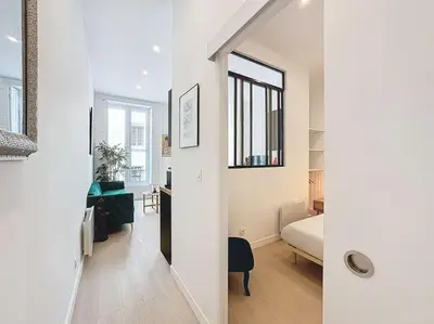 Un ou plusieurs lits dans un hébergement de l'établissement Cosy appartement, Lyon Centre Capucins 1