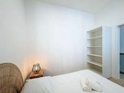 Un ou plusieurs lits dans un hébergement de l'établissement Cosy appartement, Lyon Centre Capucins 1