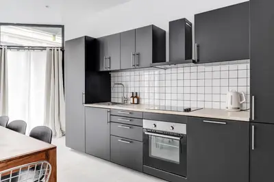 Cuisine ou kitchenette dans l'établissement NOCNOC L'Office