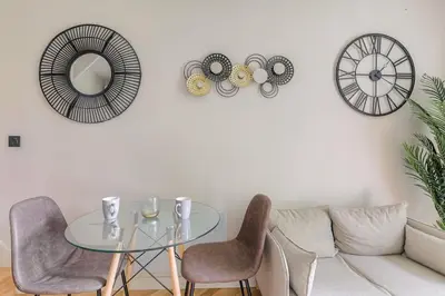 Coin salon dans l'établissement Joli duplex avec jardin, 2 personnes, Écully