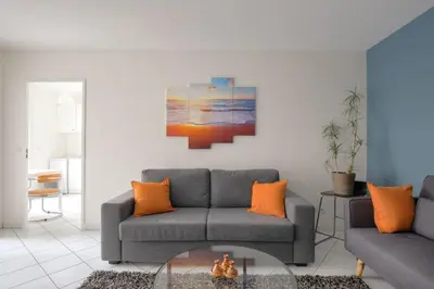 Coin salon dans l'établissement Appartement lumineux dans le quartier Jean Macé