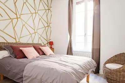 Un ou plusieurs lits dans un hébergement de l'établissement Appartement calme et neuf au coeur de Lyon