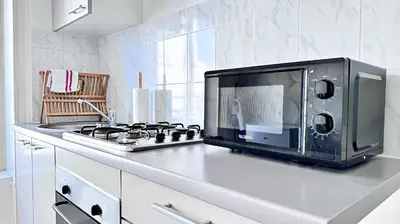 Cuisine ou kitchenette dans l'établissement Cinnabar - Appartement 10 personnes - Check in h24 & Wifi