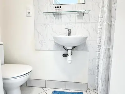 Salle de bains dans l'établissement Cinnabar - Appartement 10 personnes - Check in h24 & Wifi