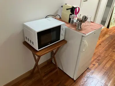 Cuisine ou kitchenette dans l'établissement Chambre de shanny