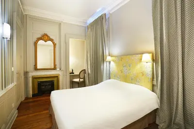 Un ou plusieurs lits dans un hébergement de l'établissement Hôtel Vaubecour - Centre Lyon Ainay - Perrache