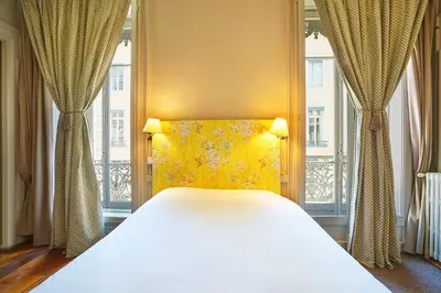 Un ou plusieurs lits dans un hébergement de l'établissement Hôtel Vaubecour - Centre Lyon Ainay - Perrache