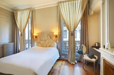 Un ou plusieurs lits dans un hébergement de l'établissement Hôtel Vaubecour - Centre Lyon Ainay - Perrache