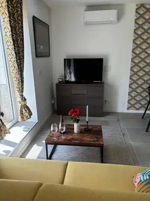 Télévision ou salle de divertissement dans l'établissement Mozart Cosy Love room