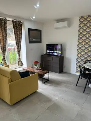 Télévision ou salle de divertissement dans l'établissement Mozart Cosy Love room