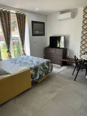 Un ou plusieurs lits dans un hébergement de l'établissement Mozart Cosy Love room