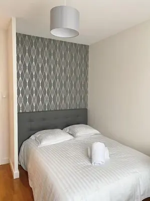 Un ou plusieurs lits dans un hébergement de l'établissement Appartement T4 charmant bien situé, Charpennes
