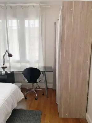 Un ou plusieurs lits dans un hébergement de l'établissement Appartement T4 charmant bien situé, Charpennes